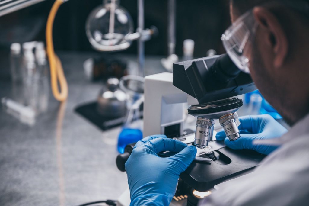 health care researchers working in life science laboratory